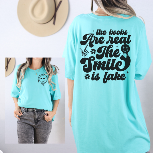 T-Shirt — “The Boobs Are Real, The Smile Is Fake” Retro Graphic Tee